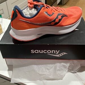 NWT Saucony Womens Sneaks size 11.5. Neon Orange in color.